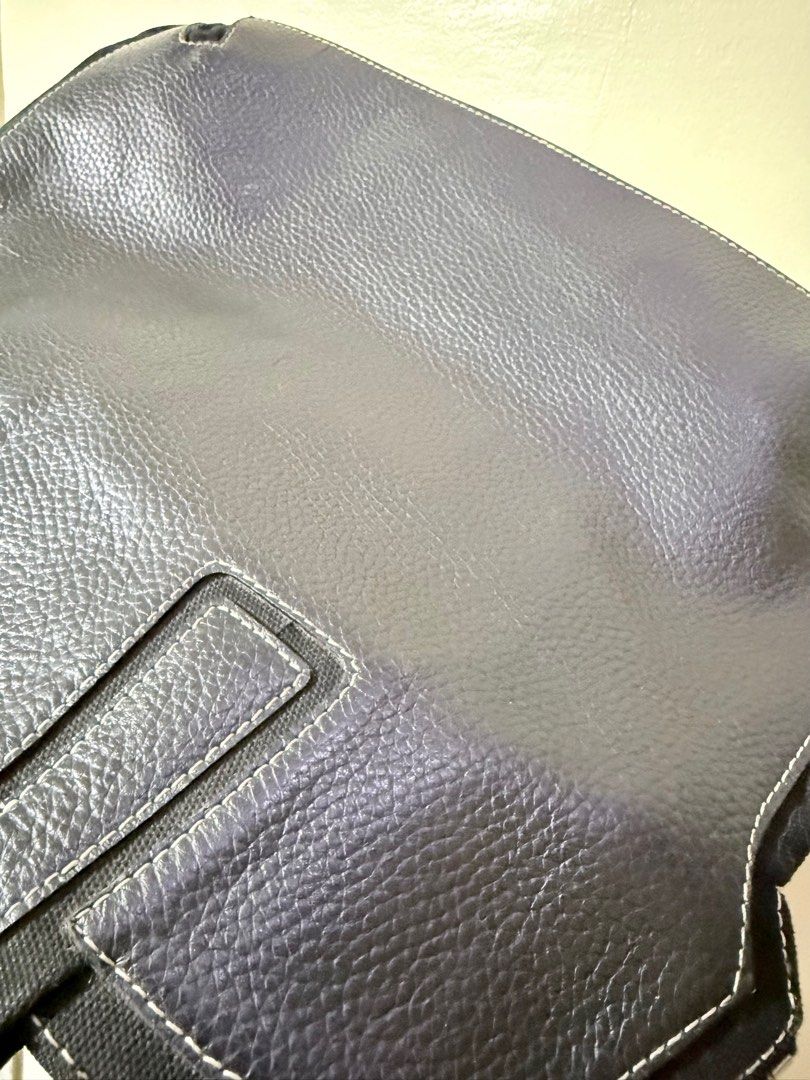 Bally Laptop Handbag (Category: Luxury Bags & Wallets) located in Cavite. Submitted by lady_speculator_ph (Listing ID 1402972947, Image 2). Description: ✅ Elegant Bally handbag crafted from textured leather. ✅ Features a zip closure, dual top handles, and a spacious interior with a zip pocket. ✅ The bag showcases a classic design with contrasting stitching details. ✅ The interior includes a Bally brand tag. Made in Italy. ✅ No damage interior and