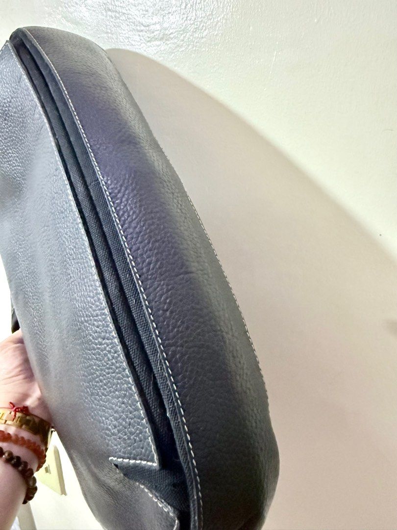 Bally Laptop Handbag (Category: Luxury Bags & Wallets) located in Cavite. Submitted by lady_speculator_ph (Listing ID 1402972947, Image 3). Description: ✅ Elegant Bally handbag crafted from textured leather. ✅ Features a zip closure, dual top handles, and a spacious interior with a zip pocket. ✅ The bag showcases a classic design with contrasting stitching details. ✅ The interior includes a Bally brand tag. Made in Italy. ✅ No damage interior and