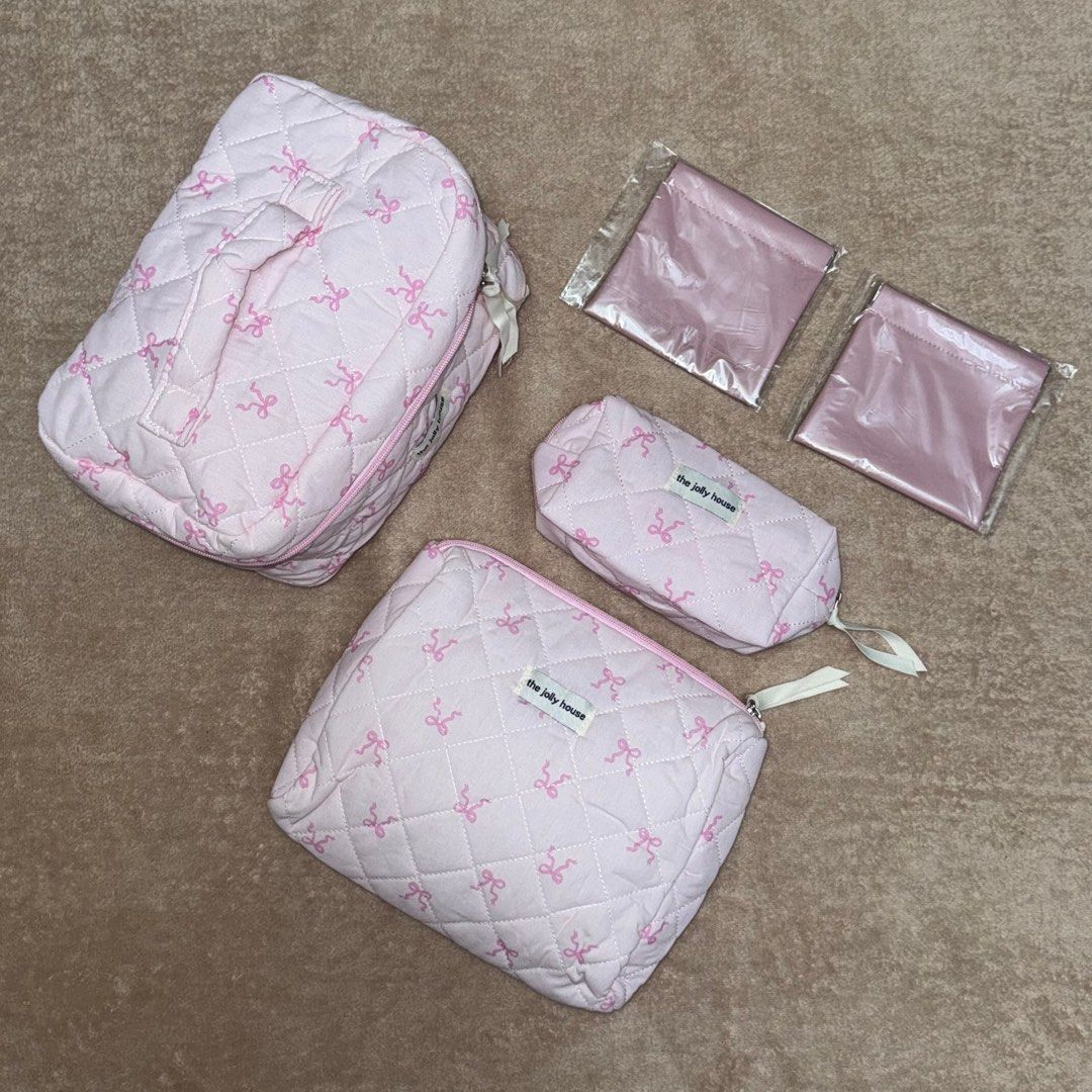 Brandnew 3in1 Cosmetic Bag Set (Category: Makeup) located in Manila. Submitted by _chingchingcart (Listing ID 1402996185, Image 1). Description: 3pcs in 1 Set: - 1 vanity bag - 1 medium pouch - 1 small pouch 5in1 pink ribbon set - 200 each 3in1 cherry set - 185 each 3in1 pink ribbon and flower set - 170 each - brandnew - sealed.