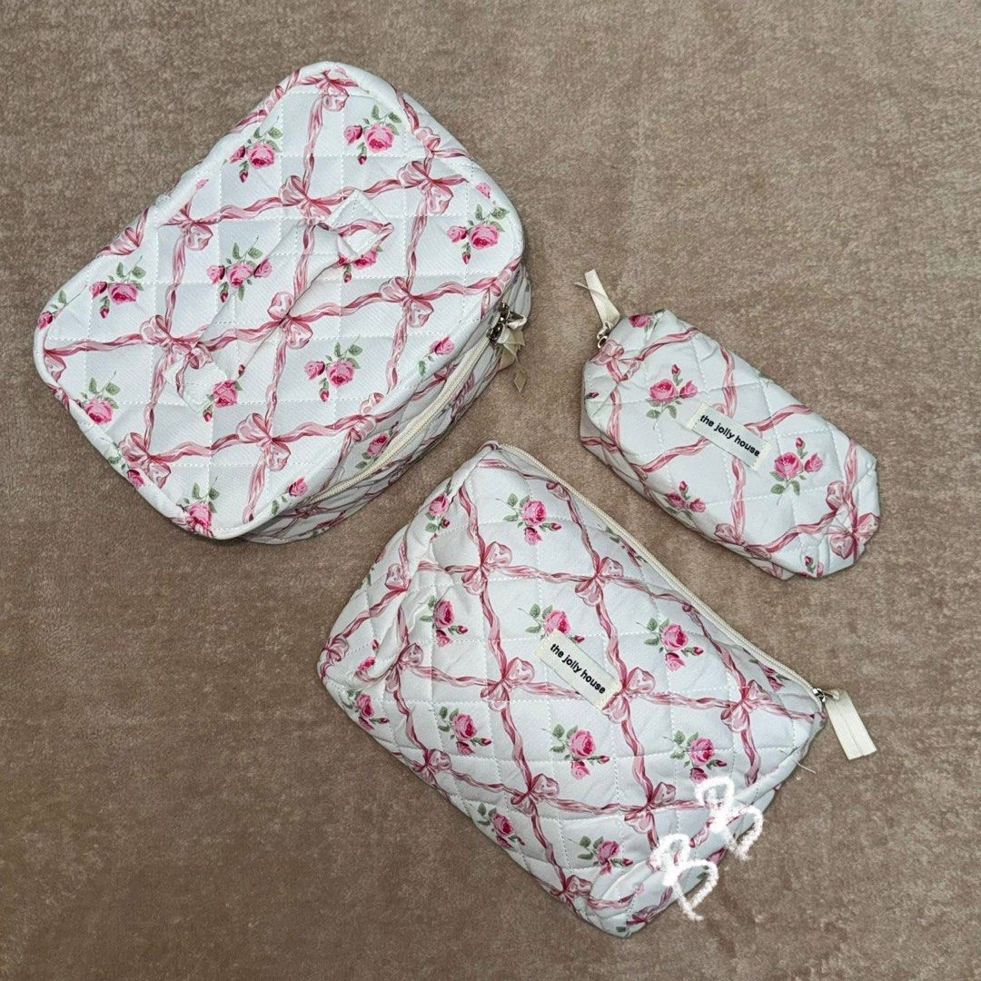 Brandnew 3in1 Cosmetic Bag Set (Category: Makeup) located in Manila. Submitted by _chingchingcart (Listing ID 1402996185, Image 2). Description: 3pcs in 1 Set: - 1 vanity bag - 1 medium pouch - 1 small pouch 5in1 pink ribbon set - 200 each 3in1 cherry set - 185 each 3in1 pink ribbon and flower set - 170 each - brandnew - sealed.
