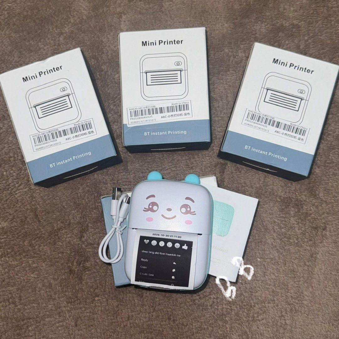 Brandnew Thermal Mini Printer - BT Instant Printing (Category: Printers, Scanners & Copiers) located in Manila. Submitted by _chingchingcart (Listing ID 1402995617, Image 1). Description: - Mini printer for instant printing - Cute and compact design - Includes manual - Portable for on-the-go use - Connects via BT - Brandnew and Sealed - Comes with free 1 Paper Roll - 9pcs blue - will give discount if getting many - 200 3pcs up | 220 1pc.