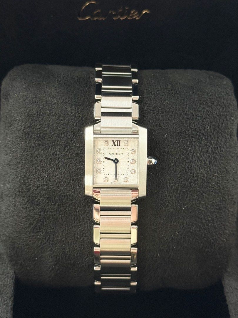Cartier Tank Francaise Small (Category: Luxury Watches) located in San Juan City. Submitted by watchwisemnl (Listing ID 1402879296, Image 1). Description: Cartier Tank Francaise Small Size White Guilloché Dial Big Diamonds Hard to find! So pretty in actual! 😍 Price: 255,000 2017 22mm x 30mm Original Cartier Quartz Movement White Guilloché Dial with Big Diamonds Hour Markers Blue Cabochon Dial Sapphire Crystal All original in excellent Inclusion: