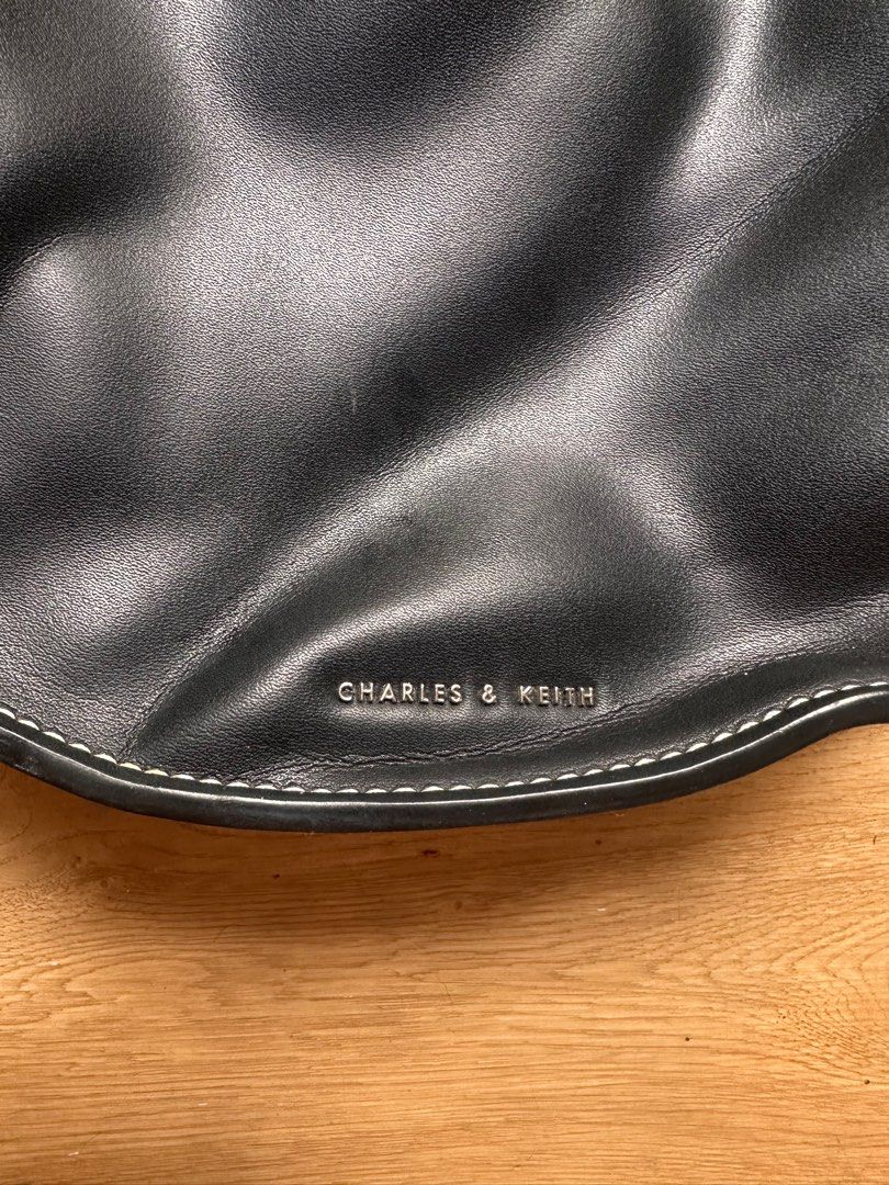 Charles and Keith (Category: Cross-body Bags) located in Manila. Submitted by ayaa29 (Listing ID 1402864976, Image 2). Description: Charles and Keith fortune cookie cross body bag .