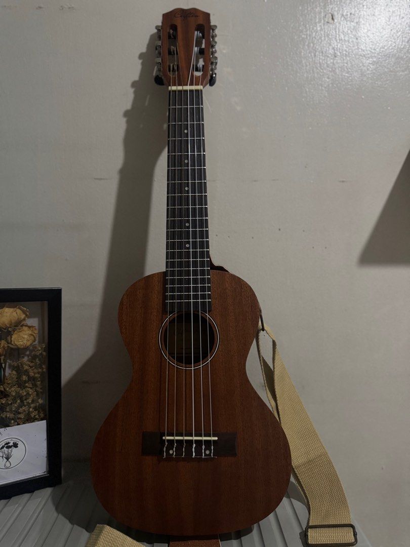 Clifton Guitalele (Category: Musical Instruments) located in Manila. Submitted by shdavid (Listing ID 1402943758, Image 3). Description: With original strap and bag Hindi po nagamit ng pamangkin 😊 .