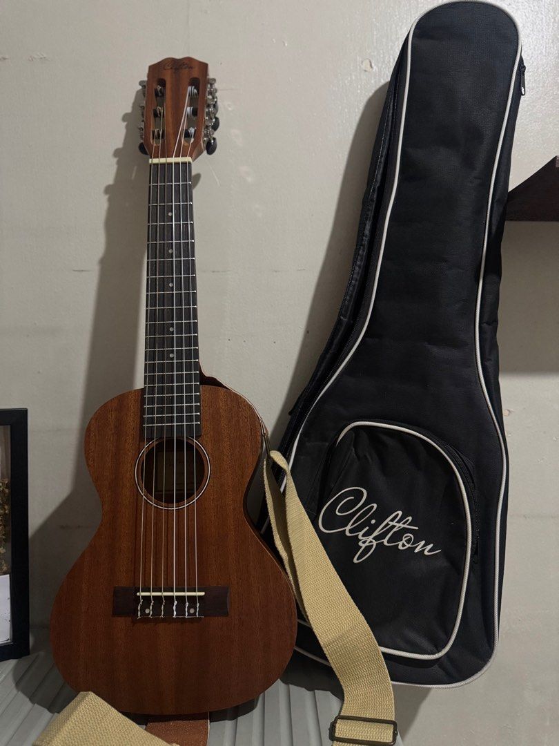Clifton Guitalele (Category: Musical Instruments) located in Manila. Submitted by shdavid (Listing ID 1402943758, Image 1). Description: With original strap and bag Hindi po nagamit ng pamangkin 😊 .