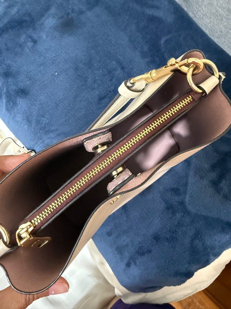 Coach Bag (Category: Cross-body Bags) located in Quezon City. Submitted by MJ_declutters (Listing ID 1402979915, Image 2). Description: Pre-loved no flaws, need some cleaning with extra strap RFS: decluttering .