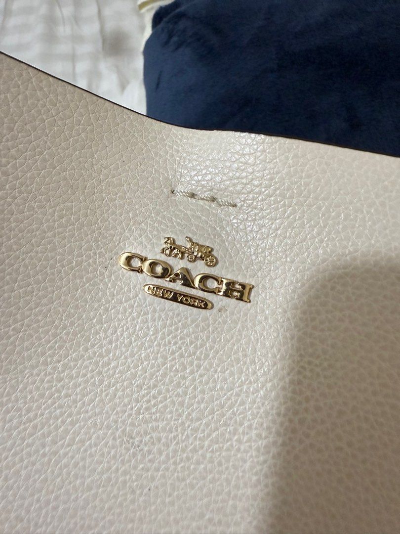 Coach Bag (Category: Cross-body Bags) located in Quezon City. Submitted by MJ_declutters (Listing ID 1402979915, Image 3). Description: Pre-loved no flaws, need some cleaning with extra strap RFS: decluttering .