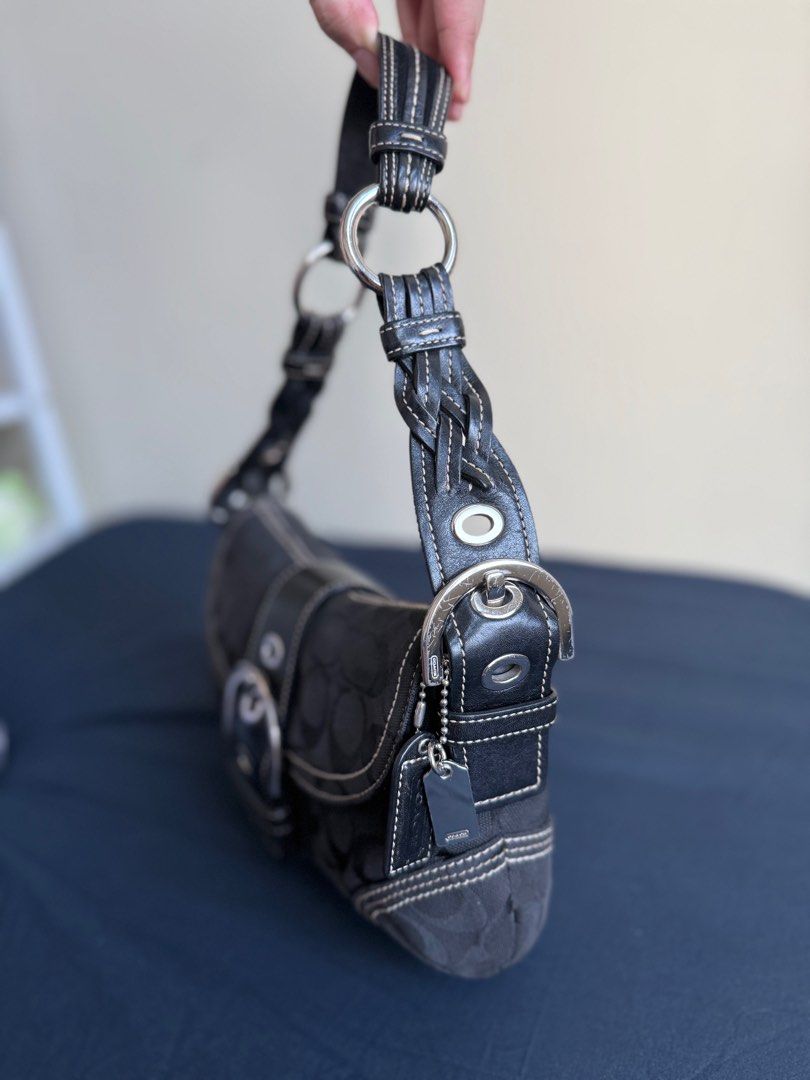 Coach Black Signature Shoulder Bag (Category: Luxury Bags & Wallets) located in Makati City. Submitted by ribsclutter (Listing ID 1402941961, Image 2). Description: Vintage Coach Signature Canvas Soho Braided Strap Black Mini Condition: 8/10 | RANK A Issue: Hardware not in perfect condition Mine: ₱7800 📍Makati City MOP: Gcash / BPI / UnionBank MOD: J&T / Lalamove / Same day delivery.