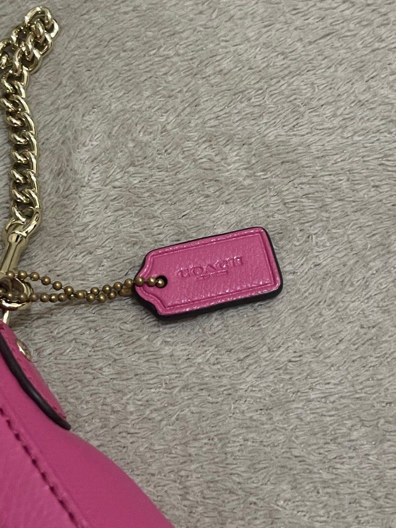 Coach Crossgrain Leather Mini Ruby Visit Crossbody Bag F34604 (Category: Luxury Bags & Wallets) located in Manila. Submitted by grandlion-1dfa (Listing ID 1402976203, Image 3). Description: rfs: bought it & thought it was a cute statement bag but sadly i can’t style it. I also need funds for my upcoming trip 😆 includes: - the original coach leather tag - attachment to turn it into cross-body No signs of wear & tear on the bag. like brand new. pr