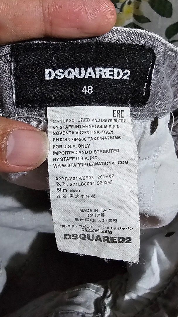 DSQUARED2 Slim Jeans - Size 48 (Category: Jeans) located in Kibawe. Submitted by Thrift_ni_Babac (Listing ID 1402972431, Image 3). Description: - Authentic DSQUARED2 slim jeans - Grey color - Size 48 - Distressed design with "2" detail - Button closure with brand name - Made in Italy - Leather patch at the back -Slim Jean No issue 1500.
