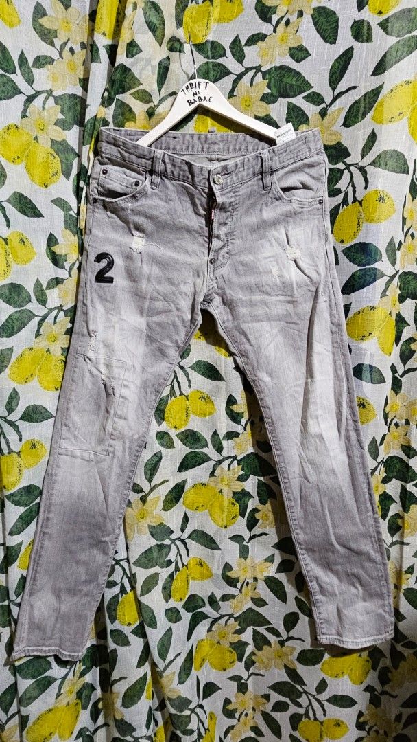 DSQUARED2 Slim Jeans - Size 48 (Category: Jeans) located in Kibawe. Submitted by Thrift_ni_Babac (Listing ID 1402972431, Image 1). Description: - Authentic DSQUARED2 slim jeans - Grey color - Size 48 - Distressed design with "2" detail - Button closure with brand name - Made in Italy - Leather patch at the back -Slim Jean No issue 1500.