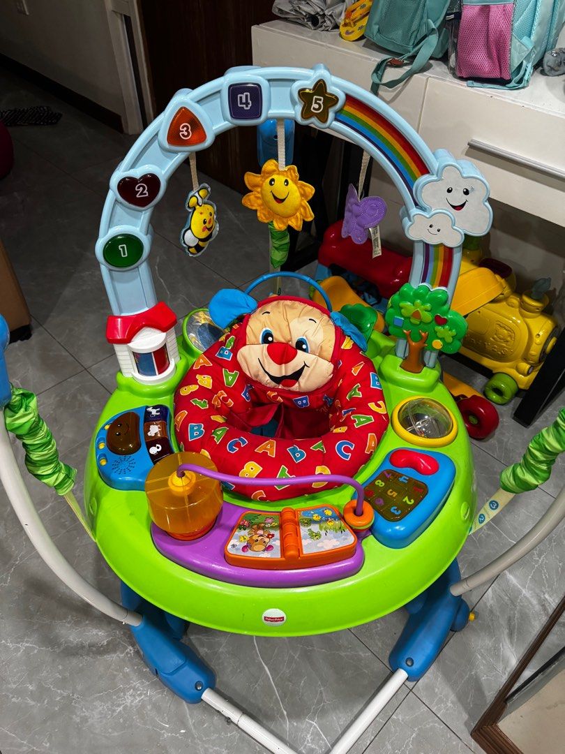 Fisher-Price Jumperoo (Category: Infant Playtime) located in Manila. Submitted by lovelylaur59755 (Listing ID 1403020070, Image 1). Description: - Fisher-Price Jumperoo - Colorful design with engaging toys - Features a rotating seat - Includes hanging toys and interactive elements - Sturdy base for safety - Adjustable height settings.