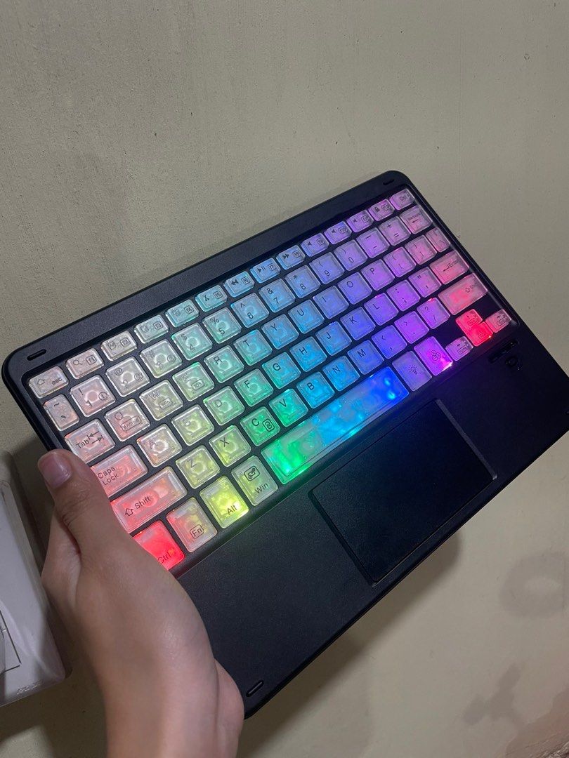 Goojodoq Wireless Keyboard with Touchpad and LED (Category: Computer Keyboard) located in Bulacan. Submitted by elibulacan (Listing ID 1403017766, Image 1). Description: - Wireless keyboard with built-in touchpad - LED backlighting with multiple color options - Sleek black design - Full set of keys - Designed for tablets and similar devices - Clear keycap design Payment first / COD.