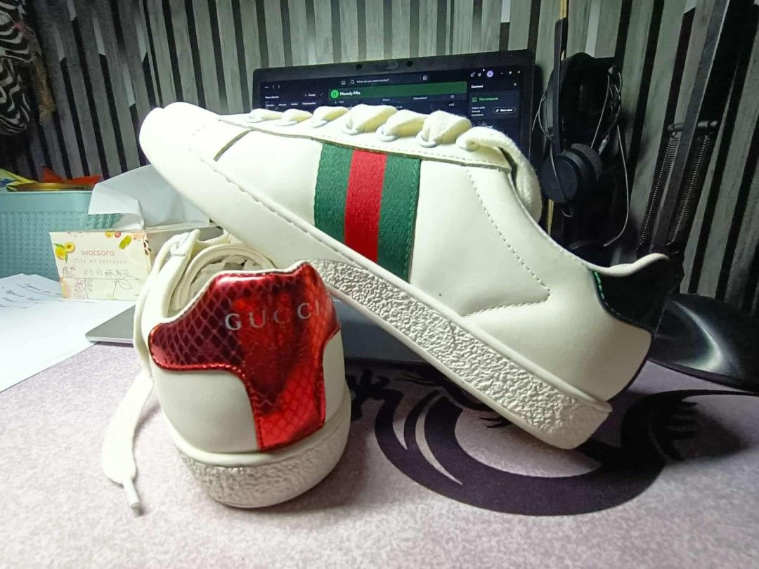 Gucci Ace Sneakers with Bee Embroidery (Category: Sneakers) located in Bislig. Submitted by cleverfish.d2c064 (Listing ID 1402910711, Image 3). Description: - Gucci Ace sneakers - Iconic bee embroidery - Green and red heel accents - Gucci logo detail - Includes original box - Includes dust bag - Includes original packaging - White laces - White sole Used once (few hours only). Badly need funds. Free Shipping thru JRS/JNT/LBC Payment thru Gcash/Ba