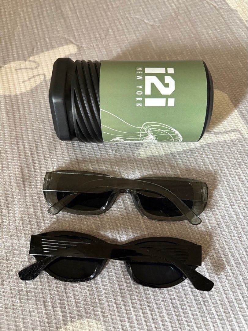 i2i sunglasses (Category: Sunglasses & Eyewear) located in Pasig City. Submitted by beldc (Listing ID 1402851252, Image 2). Description: Used I2i sunglasses. Selling as set already. The black one has signs of flaws - sort of bubble like melted plastic as shown on photo. But still in good condition. Pls dont ask for more photos.