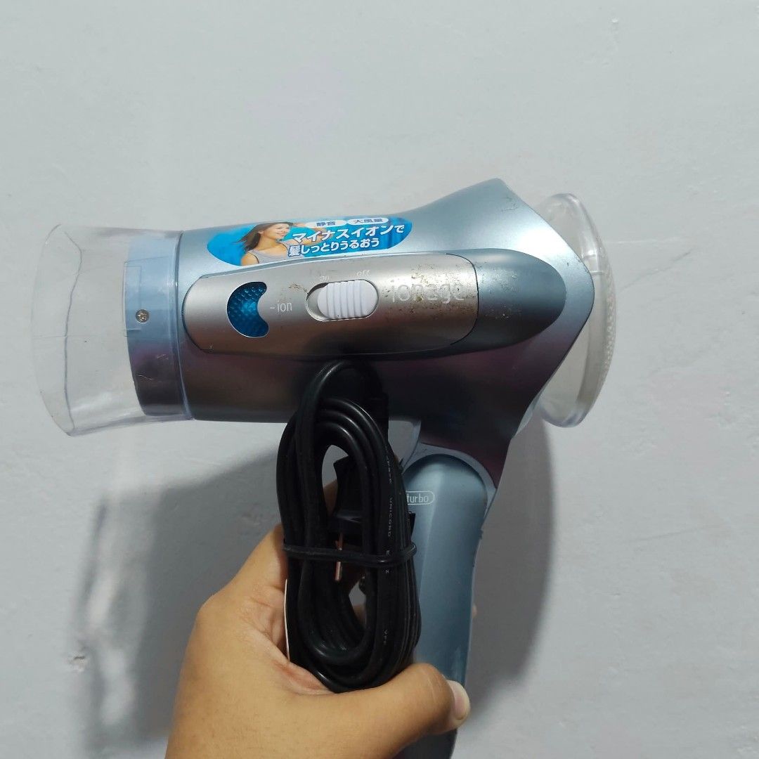 IONAGE JAPAN HAIR DRYER (Category: Hair) located in Catbalogan. Submitted by jpnsrpls (Listing ID 1402879488, Image 1). Description: 💨 IONAGE Japan Hair Dryer 🇯🇵✨ Compact and powerful — perfect for everyday use! ✅ Japan surplus ✅ With ion & steam feature for smooth, shiny hair ✅ Hot / Cool / Turbo settings ✅ Foldable handle for easy storage 📦 Tested and working ⚡ 100V (use with step-down transformer).