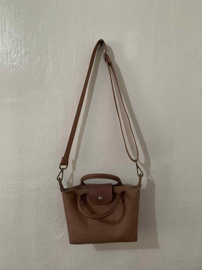 Longchamp Le Pliage Pouch Bag (Category: Luxury Bags & Wallets) located in Manila. Submitted by ourpamana (Listing ID 1402907245, Image 1). Description: Longchamp Le Pliage Pouch Bag Good condition Minor sign of usage but still excellent 1,099 pesos.