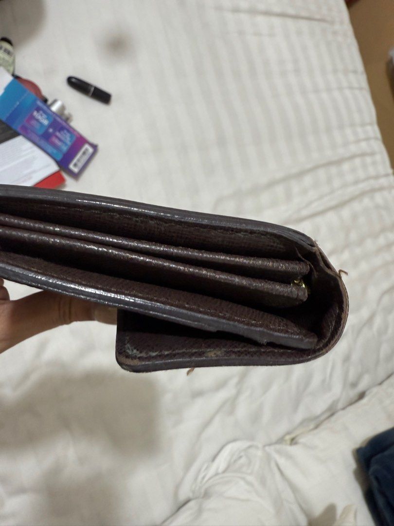 LV wallet (Category: Luxury Bags & Wallets) located in Quezon City. Submitted by MJ_declutters (Listing ID 1402883339, Image 3). Description: pre-loved 101% authentic with box and dust bag.