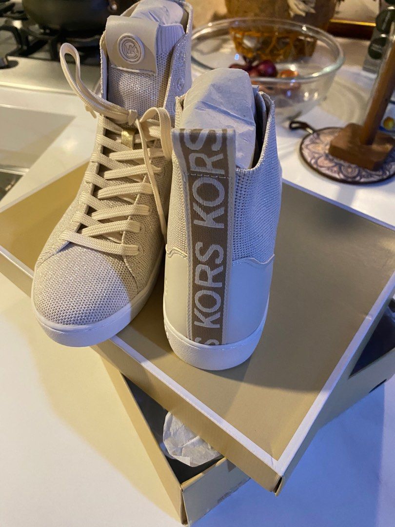 Michael Kors Sneaker (Category: Sneakers) located in Quezon City. Submitted by harleys_stuff (Listing ID 1403009383, Image 2). Description: Michael Kors Edie Metallic Knit High-Top Sneaker in the color cream Size 7.5 Brand New Authentic / Original.