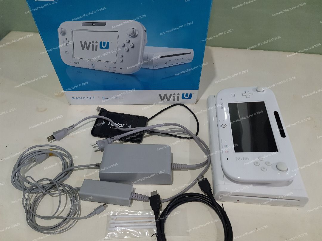 Modded Wii U Basic Set 8GB + 128GB SSD with Box (READ DESCRIPTION) (Category: Nintendo) located in Quezon City. Submitted by assortedfindsph (Listing ID 1402885691, Image 1). Description: "Post will be marked as sold once sold." Selling my Wii U Used but not abused. 6,7k (Fixed Price) Questions like “Is this available?”, “LP?”, or anything already stated in the description will be ignored. Model: Basic Set 8GB Bought in Kyoto, Japan 🇯🇵 last yea
