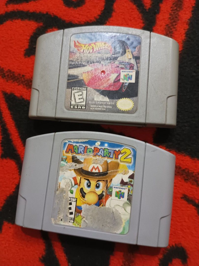 N64 Mario party 2 and Hotwheeels (Category: Nintendo) located in Quezon City. Submitted by markgolveo (Listing ID 1402887736, Image 2). Description: N64 Mario party 2 and Hotwheeels NA game carts untested units.
