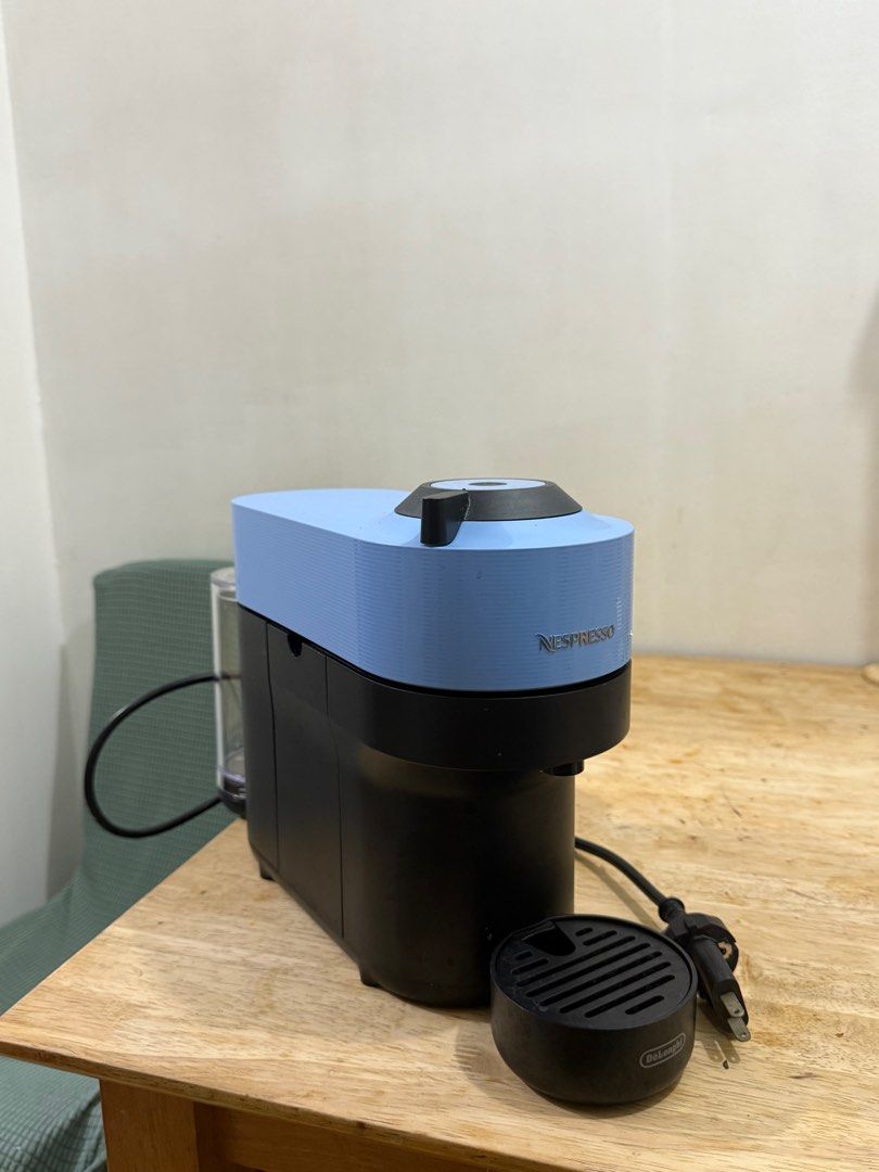 Nespresso Vertuo Pop Blue Coffee Machine (Category: Coffee Machines & Makers) located in Manila. Submitted by jo.hanna (Listing ID 1402938865, Image 1). Description: Nespresso Vertuo Pop coffee machine in a stylish blue and black design, no box included. Rarely used. What u see is what u get. Rfs: decluttering.