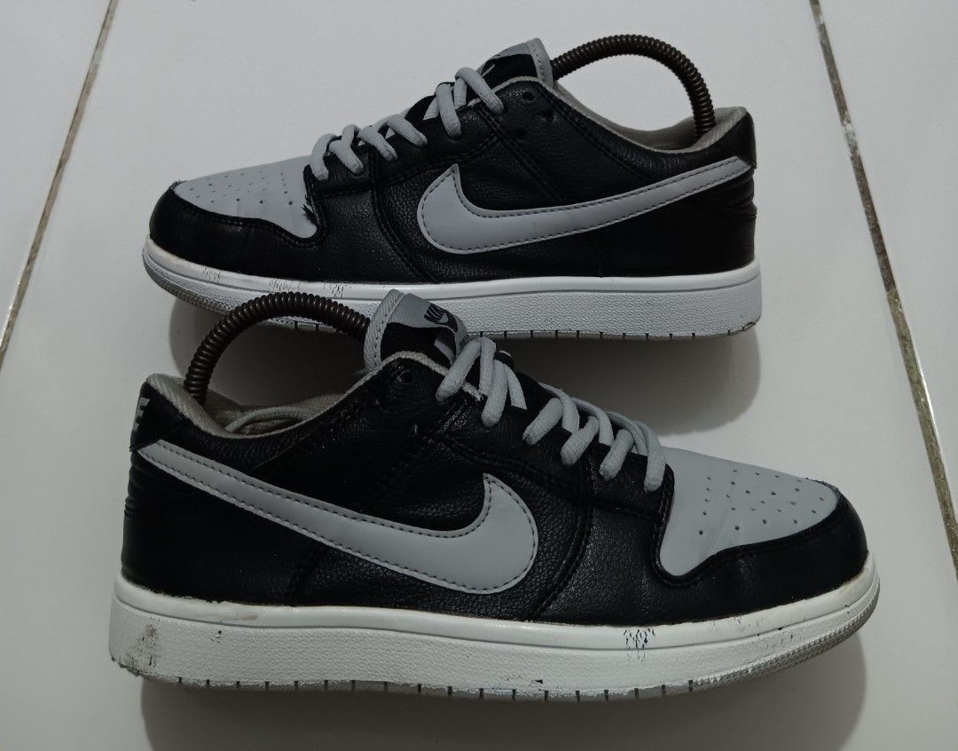 Nike SB Dunk Low Black Grey (Category: Sneakers) located in Dauis. Submitted by udenglegaspi (Listing ID 1402972254, Image 1). Description: - Nike SB Dunk Low - Black and grey colorway - Leather upper - Grey toe box and side panels - Grey Nike swoosh - White sole with grey outsole - Grey laces - Nike SB tongue logo.