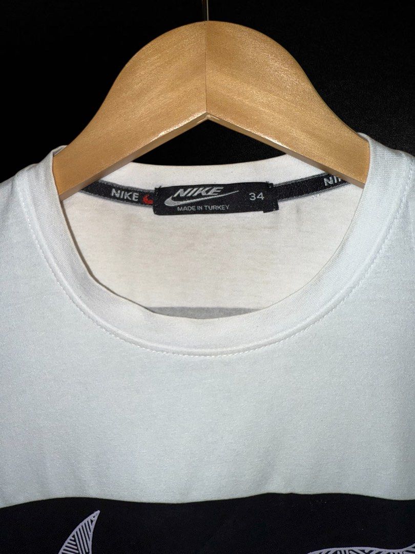 Nike T-shirt with Logo (Category: Tshirts & Polo Shirts ) located in Hermosa. Submitted by xonarchive (Listing ID 1402893929, Image 3). Description: - Asian Sizing - White Nike t-shirt - Features large Nike logo on front - Smaller Nike logo on back - Crew neck and short sleeves - Nike logo on sleeve - Made in Turkey - Size 34.