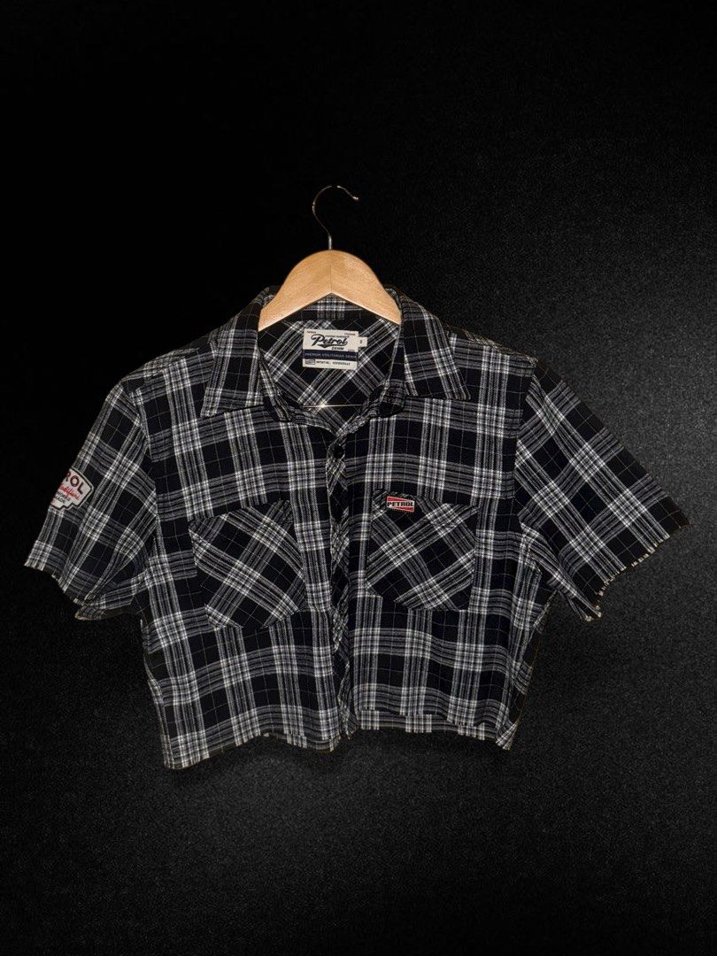 Petrol Denim Plaid Cropped Shirt (Category: Shirts) located in Hermosa. Submitted by xonarchive (Listing ID 1402898930, Image 1). Description: - Petrol Denim cropped shirt - Black and white plaid pattern - Size S - Short sleeves - Two chest pockets - Petrol logo patch on chest and sleeve.