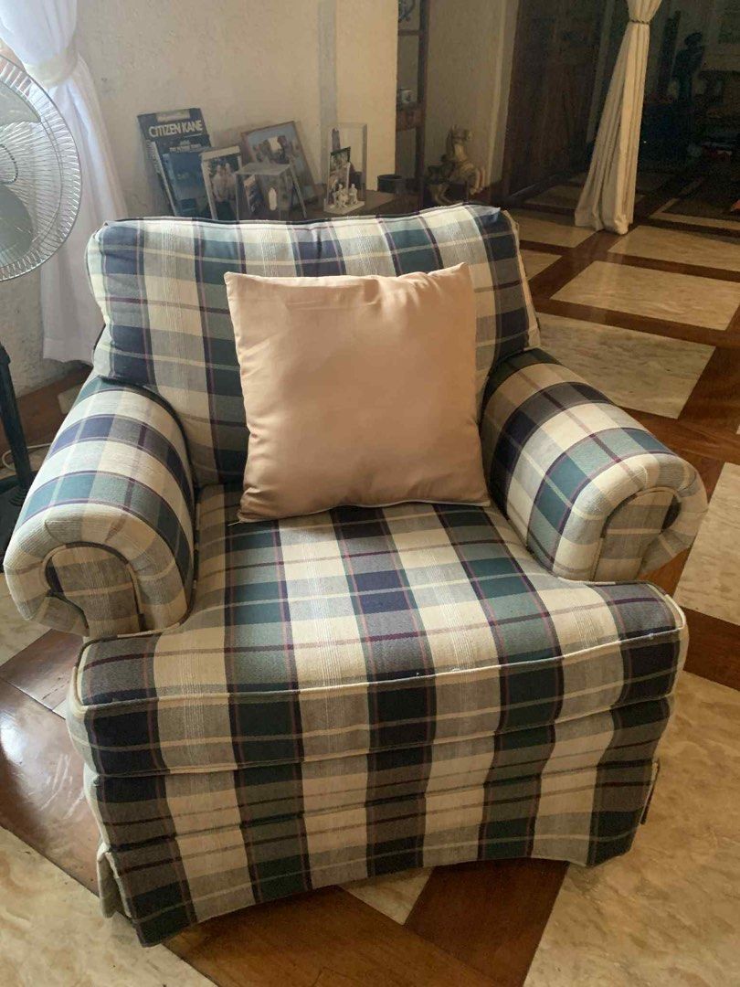 Plaid Sofa and Armchairs Set (Category: Sofas) located in Manila. Submitted by dpw_angel (Listing ID 1402970612, Image 2). Description: - Classic plaid sofa and armchair set - Includes a three-seater sofa and two armchairs - Comes with throw pillows in neutral and orange tones - Features rolled arms and skirted bases - Perfect for adding elegance to your living room.