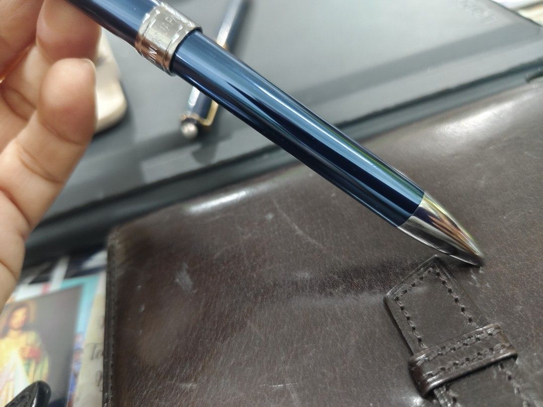 Platinum Multifunctional Double Action 3 Pen (Category: Stationery & School Supplies) located in Davao. Submitted by warmdeer-4ae1 (Listing ID 1402908302, Image 3). Description: Platinum Multifunctional Double Action 3 Pen in blue. Features a sleek design with silver accents. The pen has a blue barrel and a silver tip. The model number is Mwb-3000F#56. The pen is shown in multiple angles..