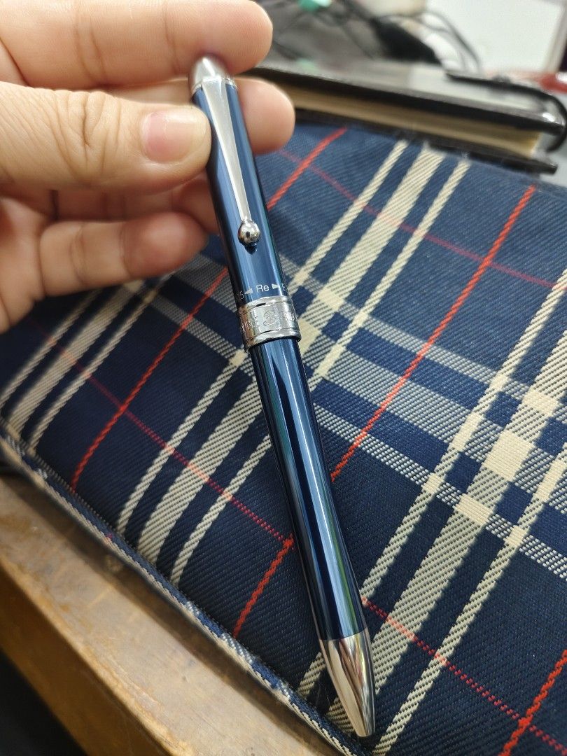 Platinum Multifunctional Double Action 3 Pen (Category: Stationery & School Supplies) located in Davao. Submitted by warmdeer-4ae1 (Listing ID 1402908302, Image 2). Description: Platinum Multifunctional Double Action 3 Pen in blue. Features a sleek design with silver accents. The pen has a blue barrel and a silver tip. The model number is Mwb-3000F#56. The pen is shown in multiple angles..