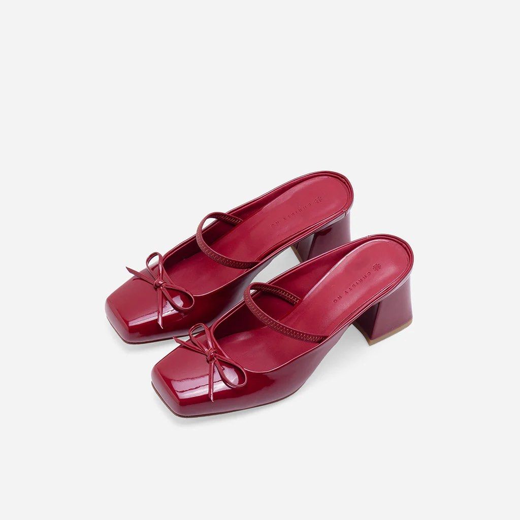 Red Patent Leather Heels with Bow (Category: Heels) located in Quezon City. Submitted by prelaved (Listing ID 1402935593, Image 3). Description: NO BOX - bought directly in Christy Ng Megamall Rfs : small for my feet - only used once Christy Ng’s Polina Heeled Mules are a modern spin on classic ballet styles. Crafted from patent vegan leather, they are cut in a boxy, square toe silhouette with a slim strap across the instep. These ballerina mules