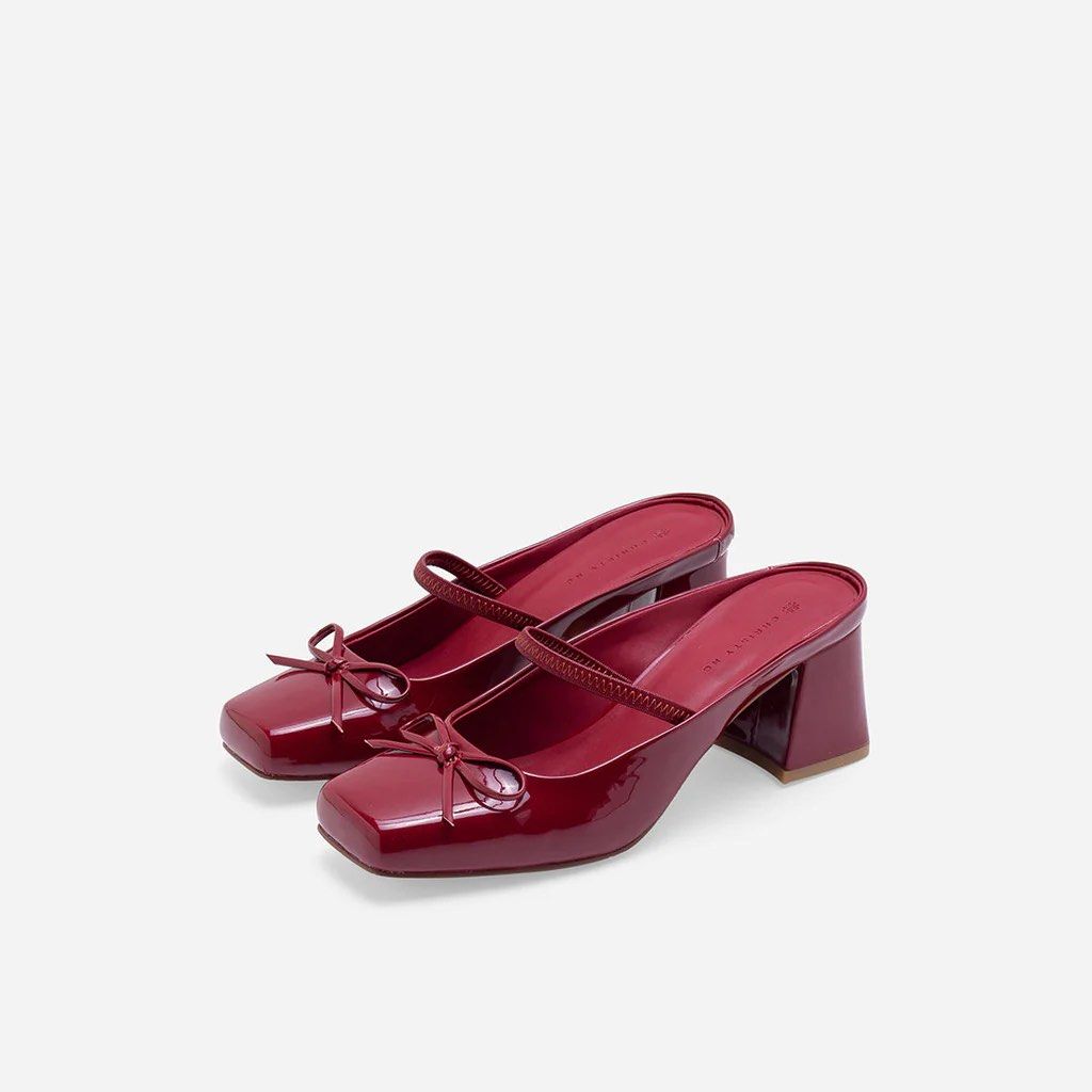 Red Patent Leather Heels with Bow (Category: Heels) located in Quezon City. Submitted by prelaved (Listing ID 1402935593, Image 1). Description: NO BOX - bought directly in Christy Ng Megamall Rfs : small for my feet - only used once Christy Ng’s Polina Heeled Mules are a modern spin on classic ballet styles. Crafted from patent vegan leather, they are cut in a boxy, square toe silhouette with a slim strap across the instep. These ballerina mules