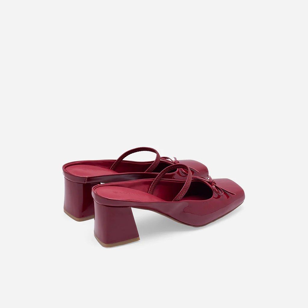 Red Patent Leather Heels with Bow (Category: Heels) located in Quezon City. Submitted by prelaved (Listing ID 1402935593, Image 2). Description: NO BOX - bought directly in Christy Ng Megamall Rfs : small for my feet - only used once Christy Ng’s Polina Heeled Mules are a modern spin on classic ballet styles. Crafted from patent vegan leather, they are cut in a boxy, square toe silhouette with a slim strap across the instep. These ballerina mules