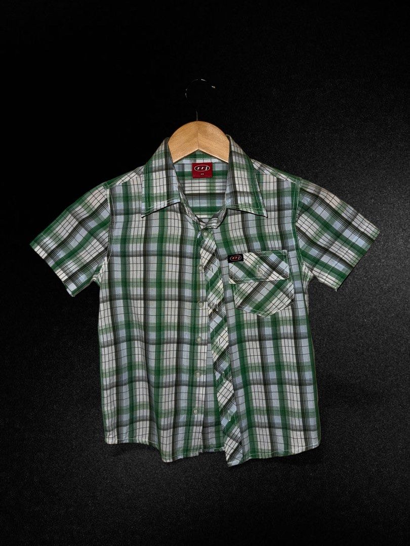 RRJ Plaid Short Sleeve Shirt (Category: Shirts) located in Hermosa. Submitted by xonarchive (Listing ID 1402898343, Image 1). Description: - Asian Sizing - RRJ plaid short sleeve shirt - Green and white color - Size 3/4 - Button-down front - Chest pocket - Collared neckline - Lightweight fabric - Classic plaid pattern - Ideal for casual wear.