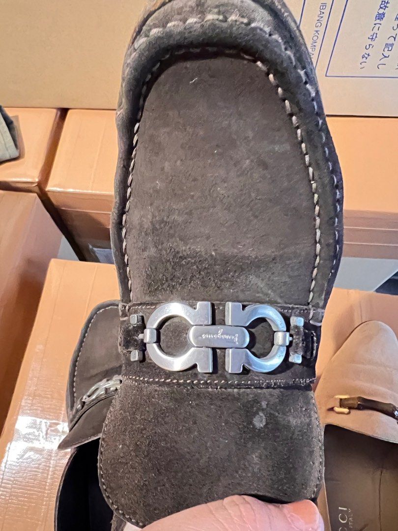 Salvatore Ferragamo Suede Loafers (Category: Boots) located in Binan City. Submitted by nihonluxxe (Listing ID 1402846605, Image 2). Description: - Authentic Salvatore Ferragamo loafers - Dark brown suede upper - Stylish chain detail - Made in Italy - Rugged sole - Size not specified.