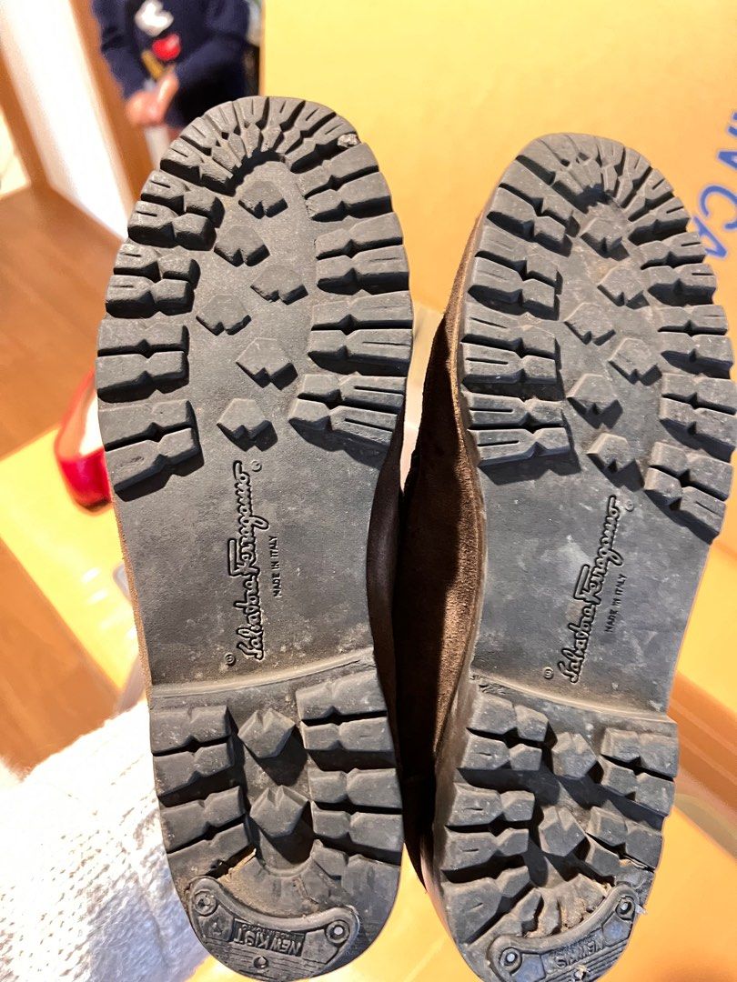 Salvatore Ferragamo Suede Loafers (Category: Boots) located in Binan City. Submitted by nihonluxxe (Listing ID 1402846605, Image 3). Description: - Authentic Salvatore Ferragamo loafers - Dark brown suede upper - Stylish chain detail - Made in Italy - Rugged sole - Size not specified.