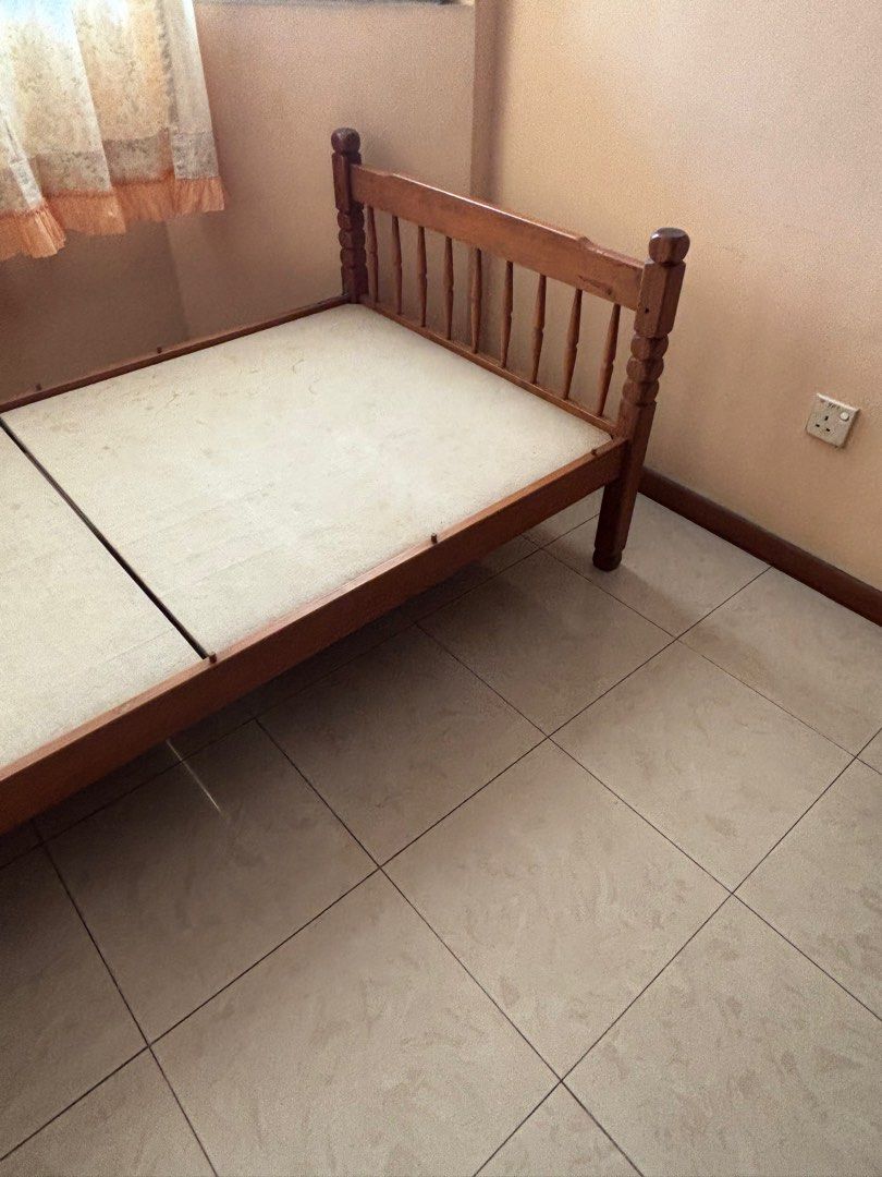Solid Pine Wood Single Bed Frame (Category: Bed Frames & Mattresses) located in Singapore. Submitted by jash.jothies (Listing ID 1402851703, Image 3). Description: - Solid Pine wood single bed frame - Classic design - Features a slatted base - Perfect for guest room or child's bedroom - Mattress not included Pick up in Serangoon area..