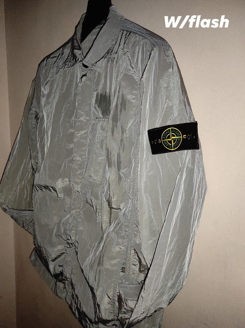 Stone island wind breaker (Category: Coats, Jackets and Outerwear) located in Manila. Submitted by luxxxxxxxx.x (Listing ID 1402946904, Image 2). Description: 29.5 x 22 excellent condition no flaws.
