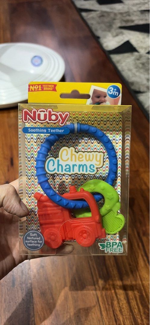 Teether Nûby Chewy Charms Soothing Teether (Category: Soothers & Pacifiers) located in Manila. Submitted by bentalang (Listing ID 1402948988, Image 1). Description: New Authentic.