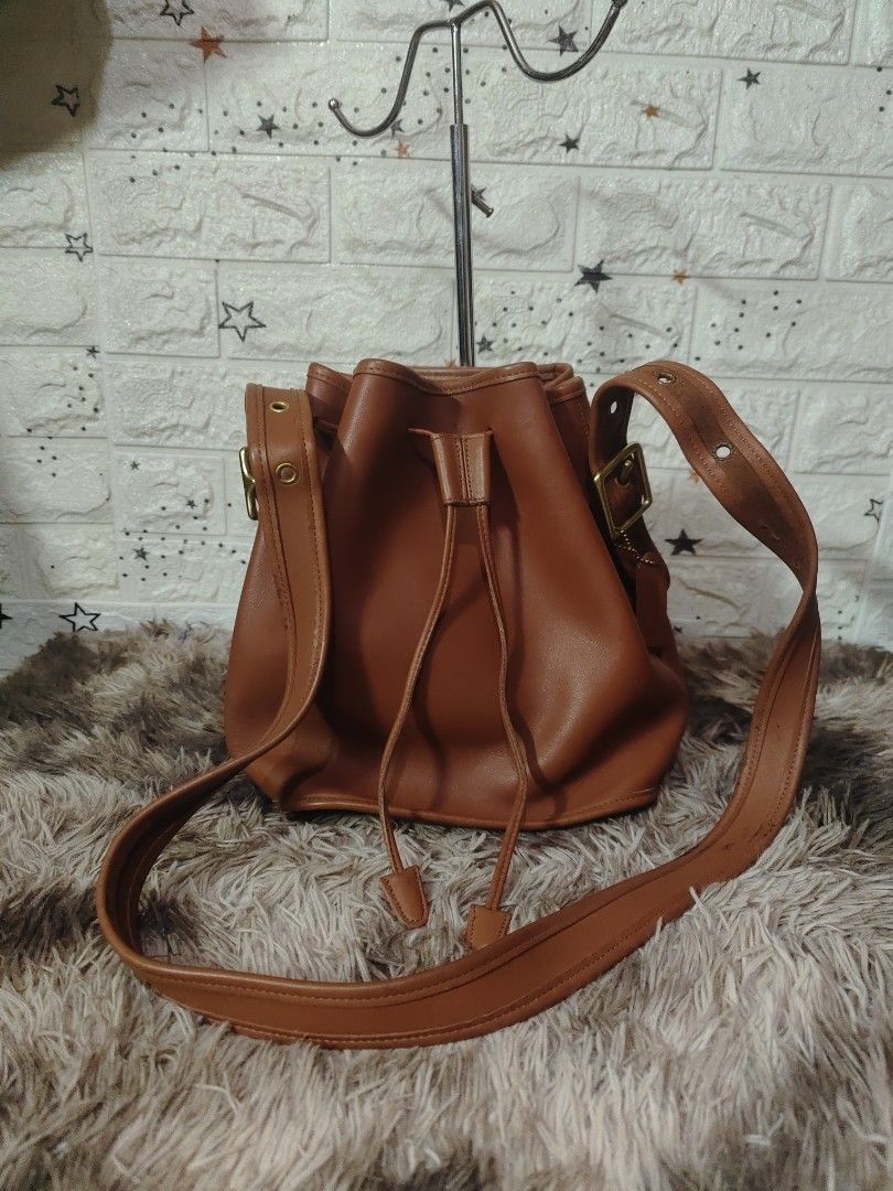 VintageCoach Bucket Bag - Brown Leather (Category: Luxury Bags & Wallets) located in Davao. Submitted by novdel (Listing ID 1402904865, Image 1). Description: guaranteed original. japan source.not ukay. no cracks. minimal watermarks lng.
