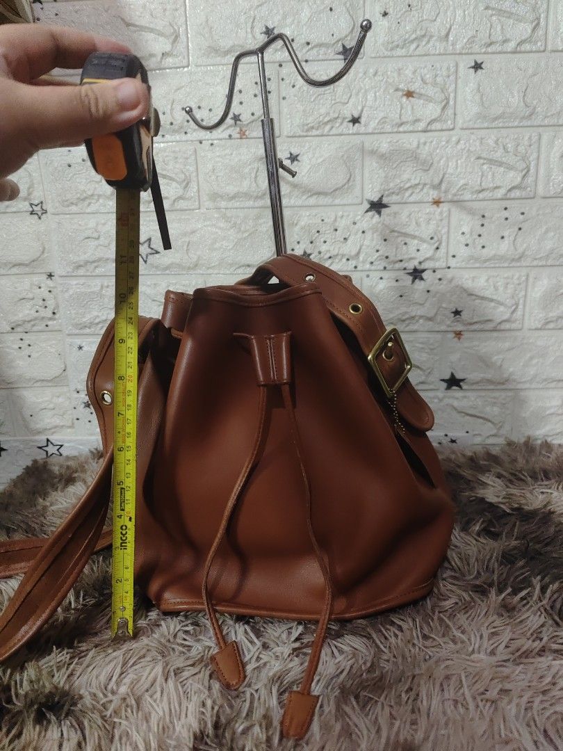 VintageCoach Bucket Bag - Brown Leather (Category: Luxury Bags & Wallets) located in Davao. Submitted by novdel (Listing ID 1402904865, Image 2). Description: guaranteed original. japan source.not ukay. no cracks. minimal watermarks lng.