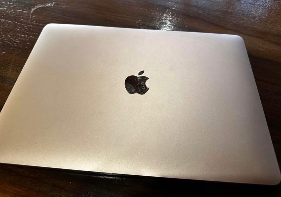 Apple Macbook Air 13-inch 2019 (Category: Laptops & Notebooks) located in Makati City. Submitted by michelle1208 (Listing ID 1403082995, Image 2). Description: Apple Macbook Air 13-inch 2019 model. Features a Retina display and is powered by an Intel Core i5 processor with 8GB of RAM. It has a 256GB storage. The laptop has a silver finish. The images show the laptop's exterior and some minor wear on the edges..