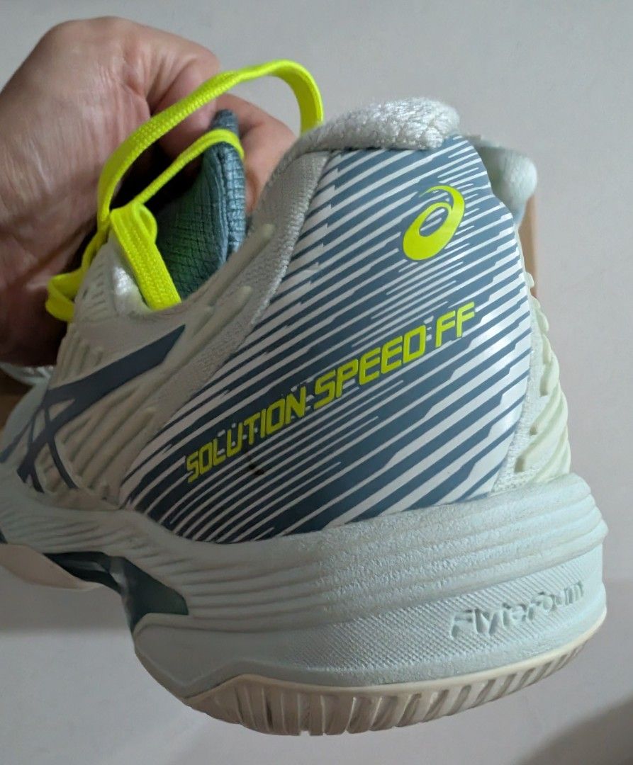 Asics Solution Speed FF Tennis Shoes (Category: Sneakers) located in Singapore. Submitted by simonwisdom (Listing ID 1403185711, Image 2). Description: Brand new Asics Solution Speed FF tennis shoes. Features a light blue and white colorway with neon yellow laces. Comes with the original box. Perfect for tennis players looking for performance and style..