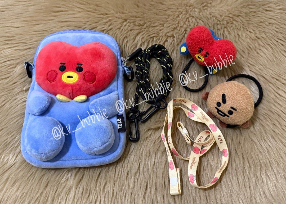 BT21 Tata and Shooky (Category: Shoulder Bags) located in Manila. Submitted by kvbubb (Listing ID 1403118376, Image 1). Description: - Take all. - All official. Bought them at a much higher price as brand new items (you may search their individual prices for comparison 🙂) - Tata Sling Bag (used twice in excellent condi) - Tata Hairtie (unused/display only/no tag) - Shooky Hairtie (unused/display only/no tag) - Tata Mask/ID strap (unused/display 