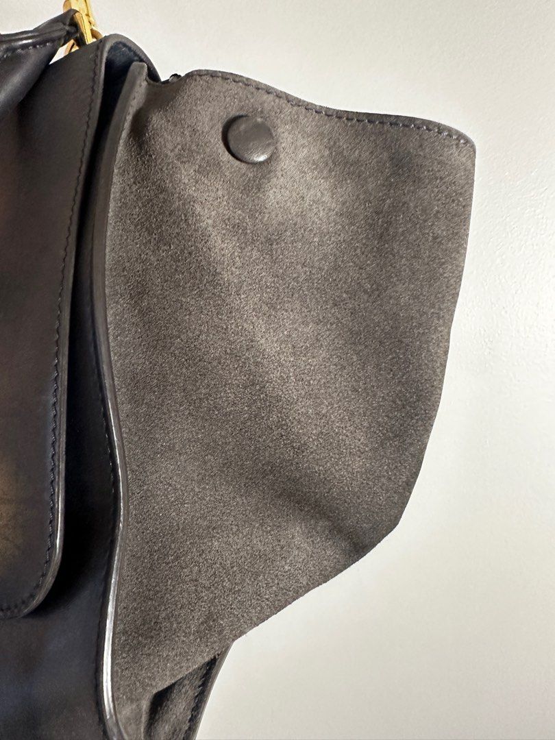 Celine Trapeze Bag Black (Category: Luxury Bags & Wallets) located in Manila. Submitted by michelle1208 (Listing ID 1403052073, Image 3). Description: - Authentic Celine Trapeze bag - Black leather and suede - Top handle and detachable shoulder strap - Gold-tone clasp closure - Interior zipped pocket with Celine logo - Includes dust bag - Made in Italy.