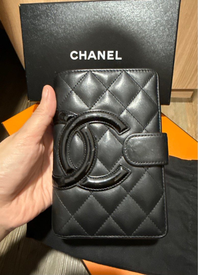 Chanel Cabron Lambskin Bi-fold Wallet (Category: Luxury Bags & Wallets) located in Las Pinas. Submitted by watchdistrictph (Listing ID 1403135127, Image 1). Description: Chanel Cabron Lambskin Bi-fold wallet Compact Good condition With dust bag and box.