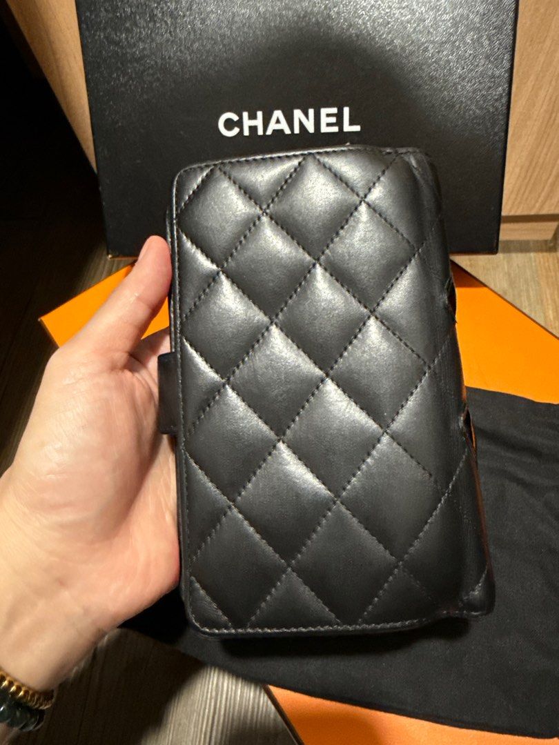 Chanel Cabron Lambskin Bi-fold Wallet (Category: Luxury Bags & Wallets) located in Las Pinas. Submitted by watchdistrictph (Listing ID 1403135127, Image 2). Description: Chanel Cabron Lambskin Bi-fold wallet Compact Good condition With dust bag and box.