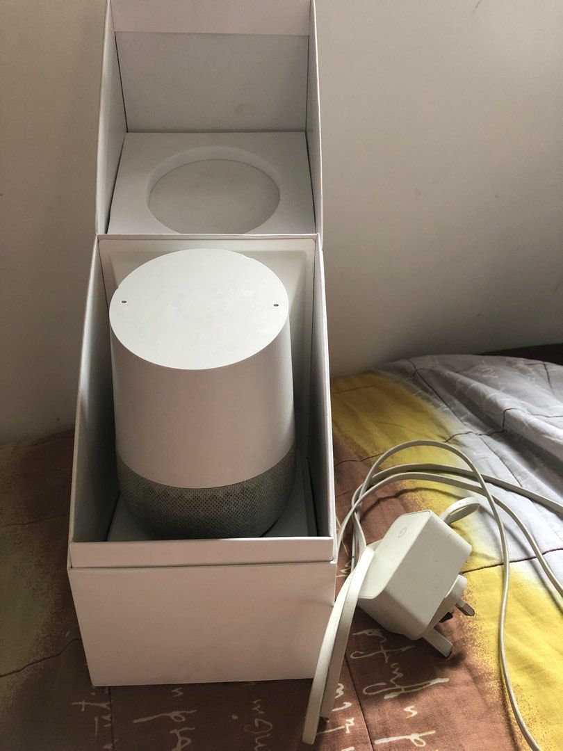 Google Home Smart Speaker (Category: Soundbars, Speakers & Amplifiers) located in Bulacan. Submitted by nanadizo31-35308 (Listing ID 1403168889, Image 1). Description: - Google Home smart speaker - Includes original box and power adapter - Color: White speaker with gray fabric base.